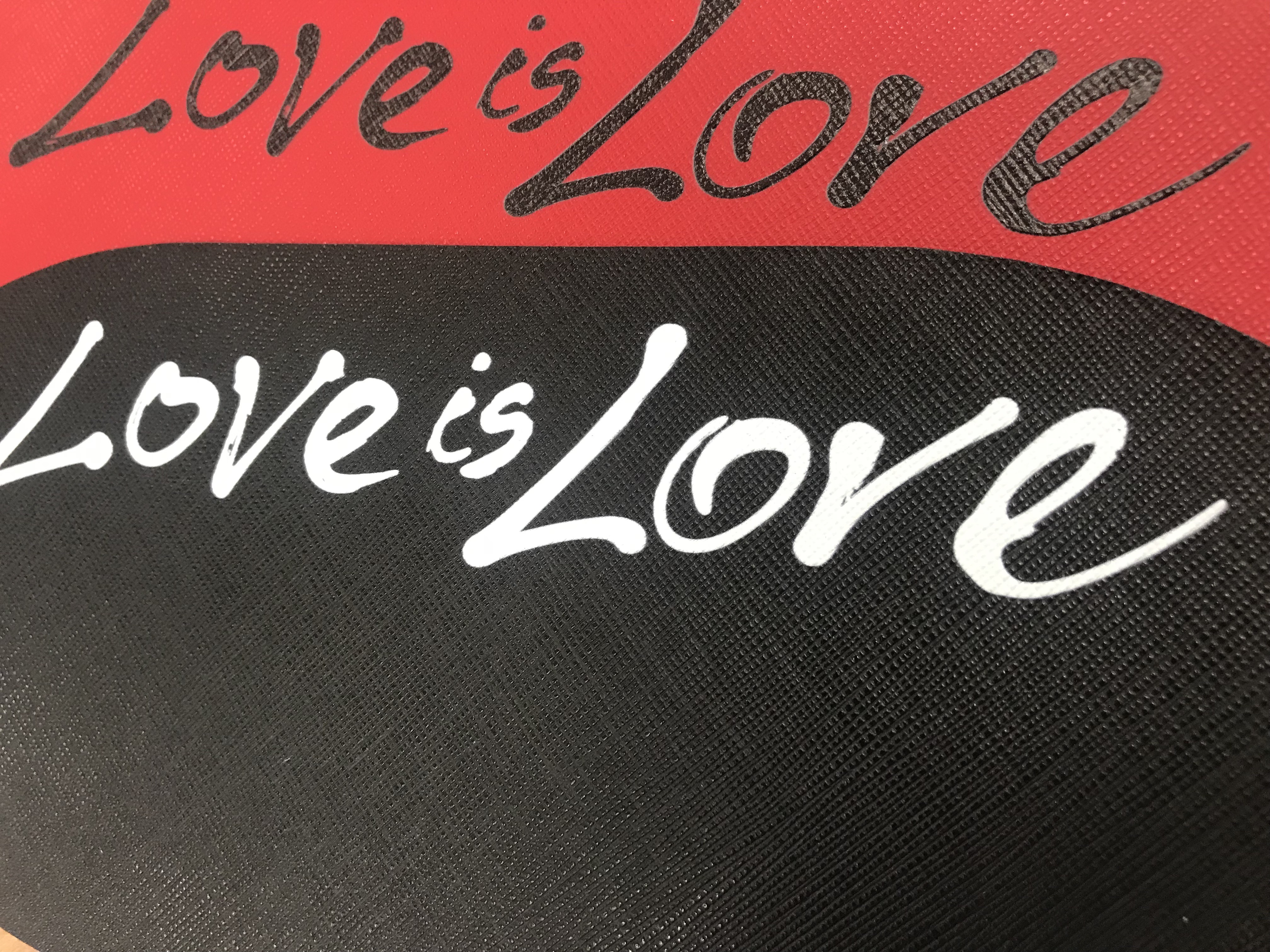 Material research detail with Love is Love lettering